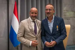 Koninklijke onderscheiding voor vertrekkend raadsgriffier Arnhem.Jozef- Gemeente Arnhem