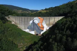 Verlaten stuwdam krijgt nieuwe functie met deze waanzinnige muurschilderij