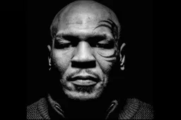 Bokslegende Mike Tyson timmert man in elkaar tijdens vlucht