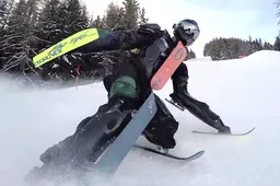 Franse uitvinder knalt als robocop de piste af met zijn futuristische pak vol ski's