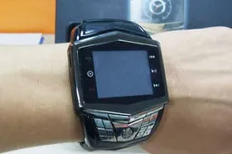 This Watch Phone Won't Deflect Bullets, But It Will Take Shady Photos