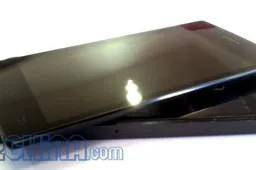 Umeox X5 5.6mm side by side with iPhone 5