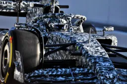 Camouflage livery typical of morning for Alfa Romeo with only four laps