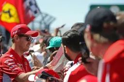 Sebastian Vettel is "very happy with the team"