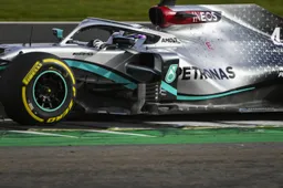 The first image of Lewis Hamilton behind the wheel of the W11!