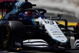 Russell jokes: "Typical, our first top 10 but we don't get points for it!"