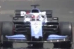 Watch: George Russell drives over drain cover in FP1