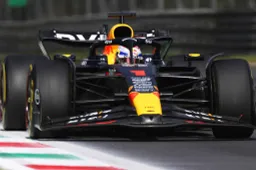 Frustrated Verstappen hits his steering wheel during Red Bull pit stop