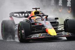 Verstappen drives his Red Bull with one hand on rainy Suzuka