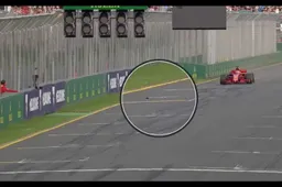 Vettel reed over pitboard bij finish GP Australië