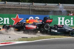 Iconic image of Verstappen on top of Hamilton and Ricciardo's win