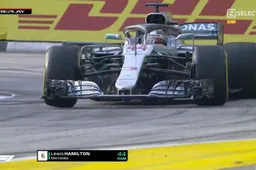 Slo-mo: Lewis Hamilton drift door Singapore in VT1!