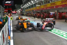 Norris hits pit lane wall after colliding with Leclerc!