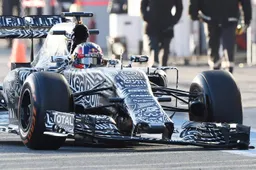 Kvyat clips wall and drives with no front wing