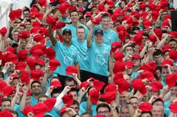 Mercedes salute absent Lauda with red cap tribute