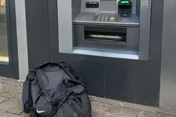 Duffel Bag Beside Dutch ATM