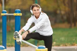 beautiful-woman-listening-music-stretching (1)