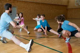 medium-shot-kids-exercising-school-gym