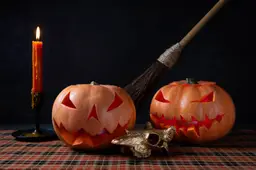 spooky-halloween-carved-pumpkin-lantern-with-candelabra