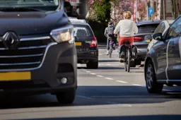fietser op drukke weg in utrechtfietsersbond