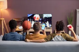 diverse group of friends watching basketball match 2023 11 27 05 33 24 utc