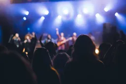 crowd at concert and blurred stage lights 2025 03 27 02 00 34 utc