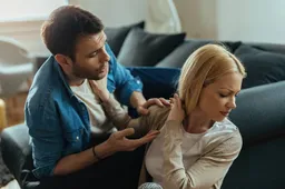 displeased woman refusing talking with her boyfriend while having argument home