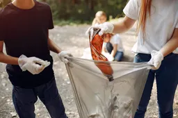 children collects garbage garbage bags park