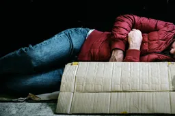 homeless-man-sleeping-out-cold