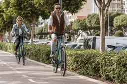 man-woman-riding-their-bikes