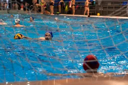 athletes-playing-water-polo-pool