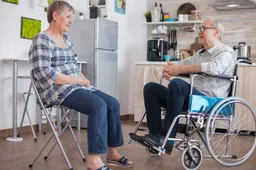 old-woman-her-disabled-husband-wheelchair-chatting-kitchen-elderly-person-having-conversation-with-husband-kitchen-living-with-disabled-person-with-walking-disabilities