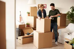 couple-packing-stuff-plenty-cardboard-boxes