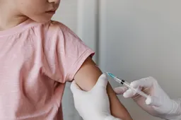 doctor-administering-vaccine-kid