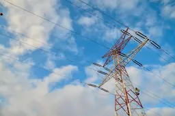 low-angle-shot-high-transmission-tower-with-cloudy-blue-sky