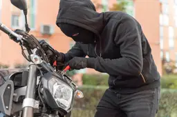close-up-man-preparing-steal-motorcycle