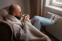 man-drinking-hot-beverage-energy-crisis