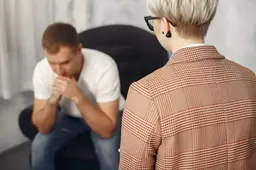 man-sitting-psychologist-s-office-talking-about-problems