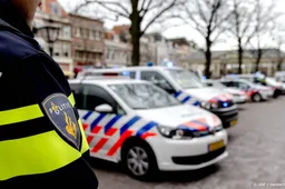 Aanhouding 23-jarige man in zaak zwaargewonde op dak in Amsterdam