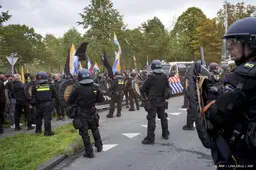 Politie vergoedt spullen van in water geduwde fotograaf
