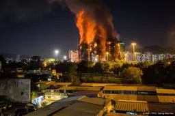 Leider Hongkong biedt excuses aan na rapport over dodelijke brand