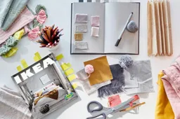bookmarked ikea catalog on a desk beside a textile swatches c2bf3b15107412fe4e136907d8710c8e 1 1