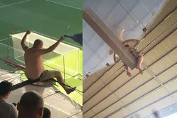 FOTO: Supporter waagt z'n leven om wedstrijd van zo dichtbij mogelijk te bekijken