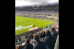 Hallucinante beelden: Beerschot-fan gooit vuurpijl in Antwerp-vak (VIDEO)