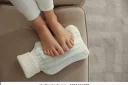 woman-warming-feet-hot-water-260nw-1901406373