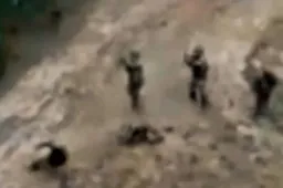 troops-tell-body-pits-unarmed-1061781627