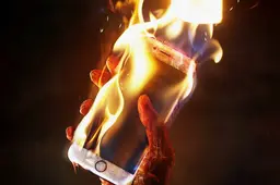 iPhone-on-Fire-Burning-in-Hand-Excessive-Heat-Damage