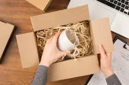 top-view-woman-preparing-cyber-monday-package-1-768x518-690x0-c-default