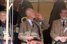 King Charles drinking whisky