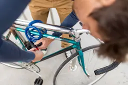 close-up-casual-male-securing-his-bike